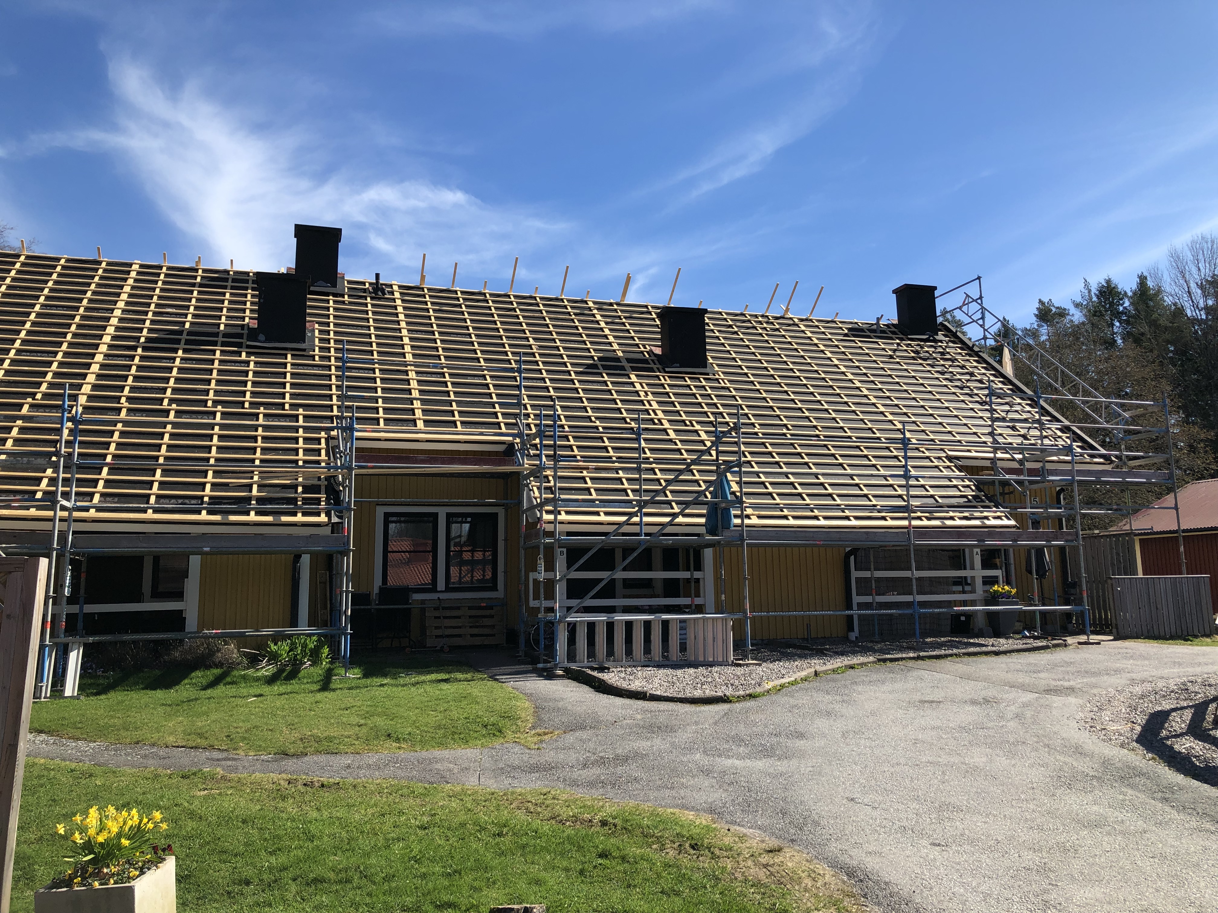 Takbyte på Vallmovägen 5